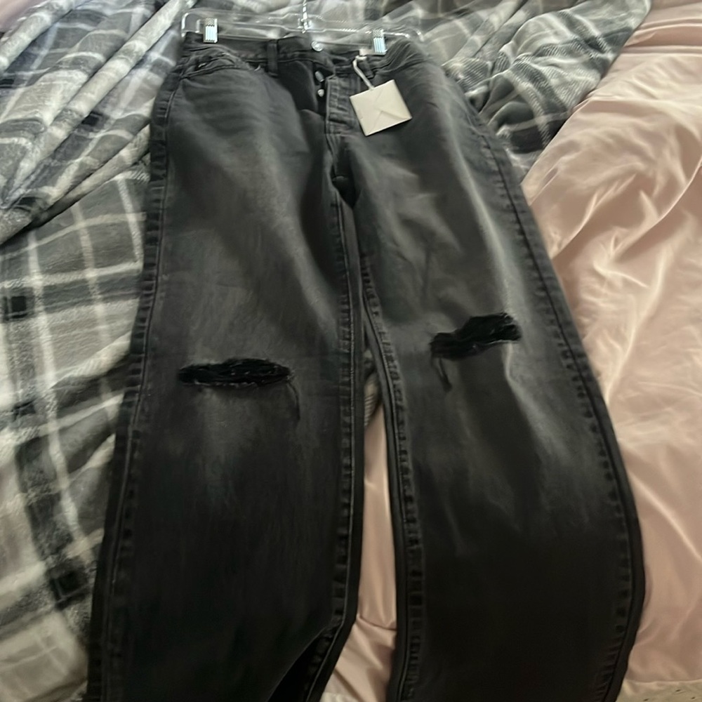New jeans never worn. Bought and they are a little too snug for me.